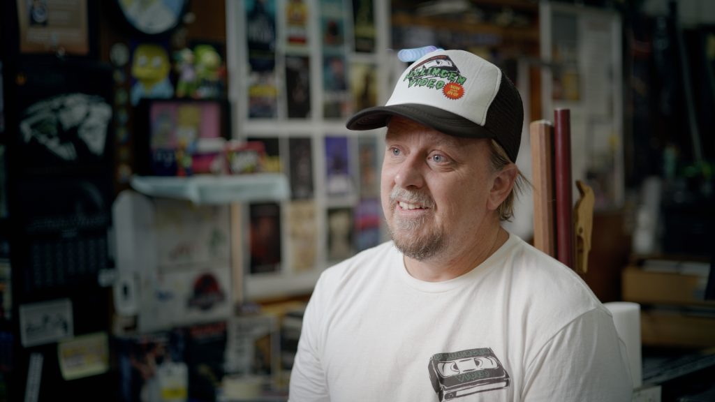 Rod O'Hara owner of Bellingen Video Connection in his store in the documentary Return Chute: The survival of a small town video store